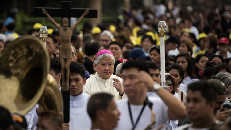 Archbishop Socrates Villegas takes part in protest march