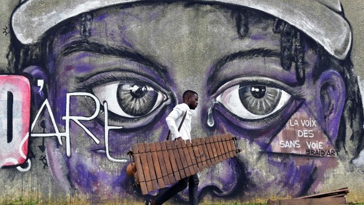 African student of music with the Balafon