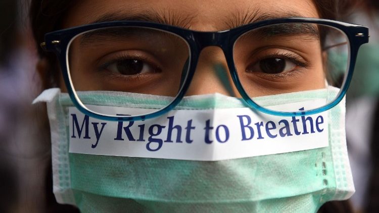An Indian youth in a march to raise awareness about air pollution.