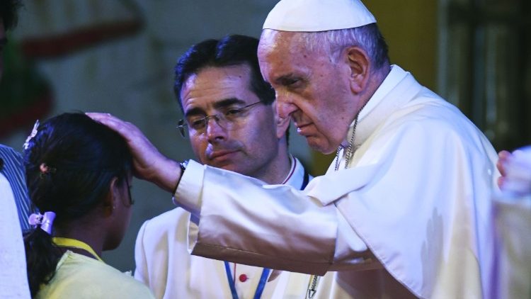 Pope Francis makes a gesture of compassion