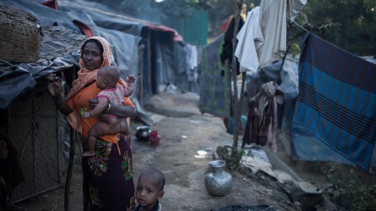 A Rohingya woman and her child in a refugee camp in Bangladesh