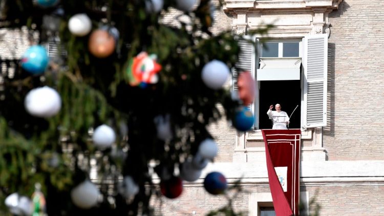 Pope Francis giving his Angelus address on the Feast of the Immaculate Conception with the Christmas Tree in the foreground.