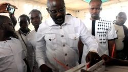 topshot-liberia-politics-vote-1514311063543.jpg