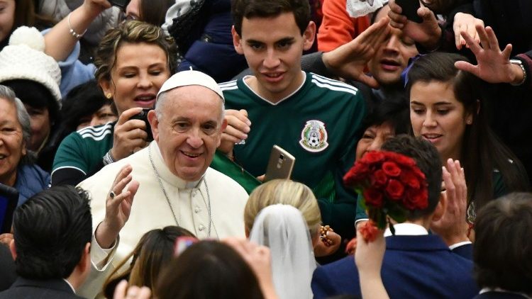 Pope Francis greets pilgrims and visitors at his General Audince in the Paul VI Hall