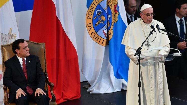 Pope Francis speaks next to Pontifical Catholic University of Chile rector Igancio Sanchez Diaz 