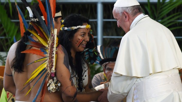 Pope Francis greets representatives of indigenous communities of the Amazon basin during a visit to the Peruvian city of Puerto Maldonado in January 2018