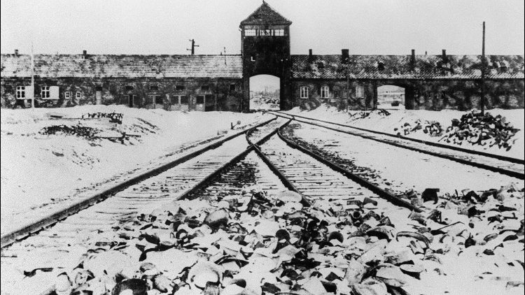This file photo from January 1945 shows the Auschwitz concentration camp's gate and railways after liberation