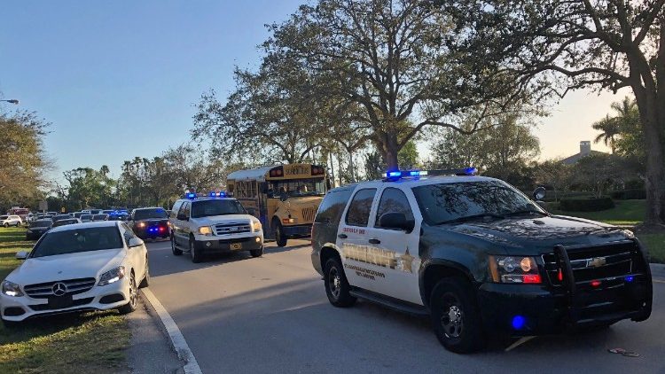 Sheriff vehicles are seen at the Marjory Stoneman Douglas High School in Parkland, Miami