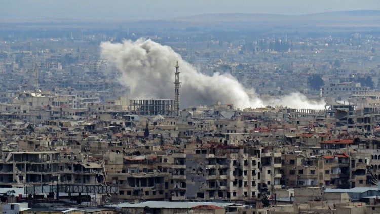 Smoke rises over rebel-held enclave of Eastern Ghouta in Syria