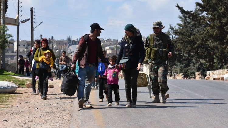 Families flee from the fighting in Northern Syria