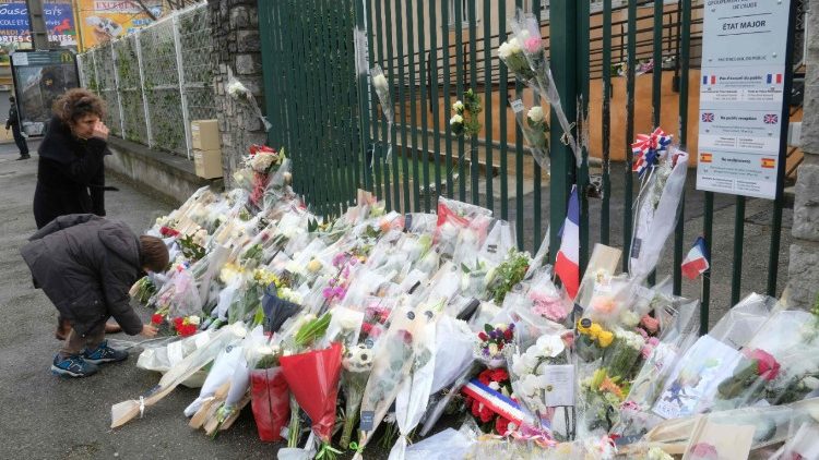 Flowers outside the gendarmerie of Carcassonne pay tribute to slain Lieutenant-colonel Arnaud Beltrame