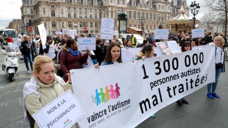 People participate in the "March for Hope" rally in Paris marking World Autism Awareness Day