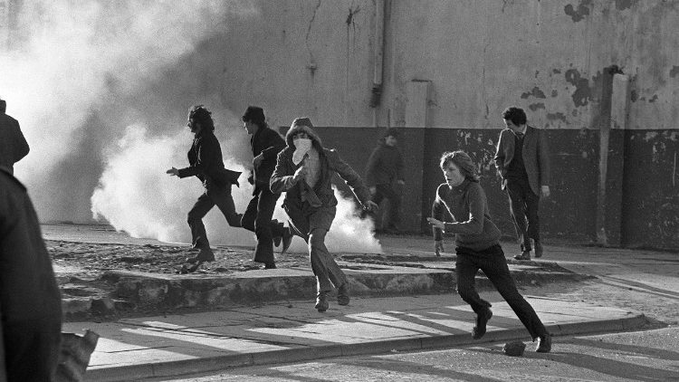 File photo taken on March 2 1972 showing young Catholic rioters hurl projectiles at British soldiers during a protest rally 