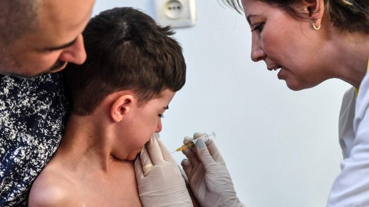 A young patient receives a vaccination