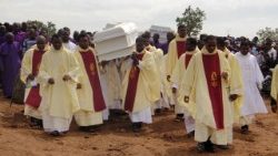 topshot-nigeria-unrest-funeral-1527065893666.jpg