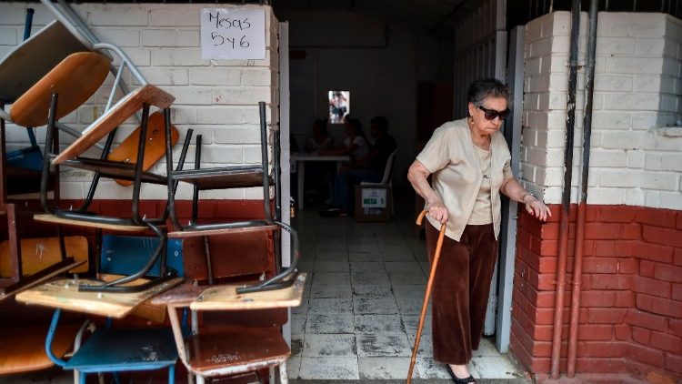 An elderly woman at a polling station in Calì during Presidential elections in Colombia