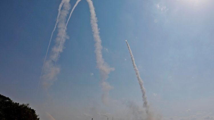 Israel's military launch missiles at positions in the Gaza Strip