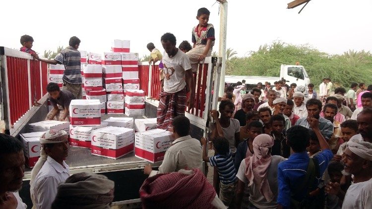 Humanitarian aid being unloaded at a coastal town near Hodeida in Yemen
