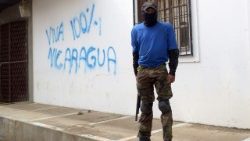 topshot-nicaragua-unrest-paramilitaries-1531988688216.jpg