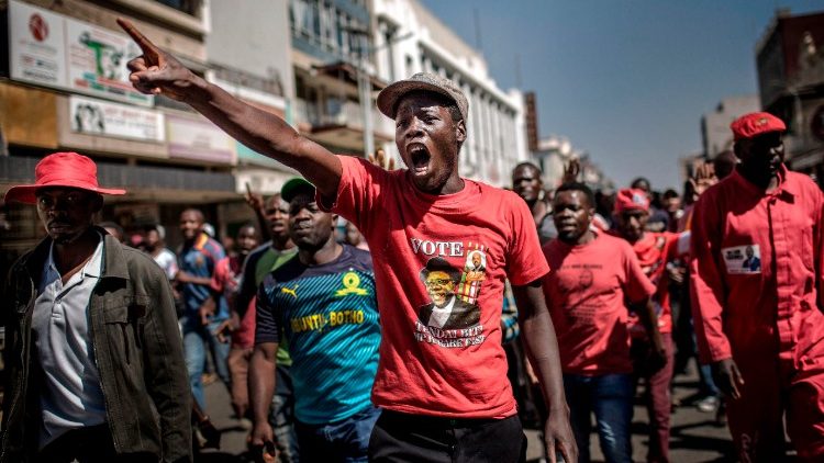 Supporters of the opposition party MDC protest against alleged fraud by the election authority and ruling party