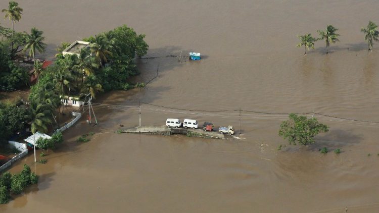 topshot-india-flood-weather-1534613267845.jpg