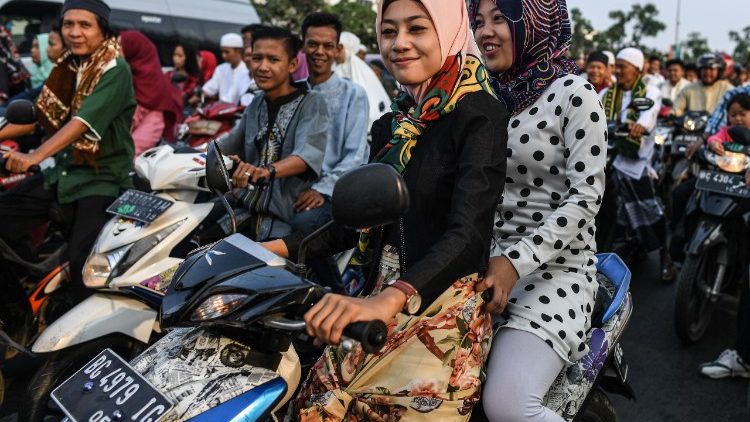 Des femmes indonésiennes musulmanes lors de la fête du sacrifice, le 22 août 2018 à Palembang. 