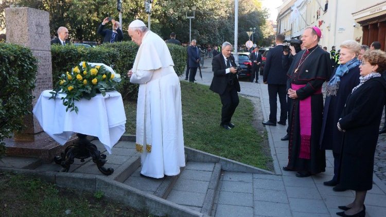Pope Francis prays at the memorial to the Victims of the Ghetto in Vilnius, Lithuania
