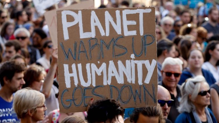 Demonstators take to the streets  in Paris calling for action against climate change