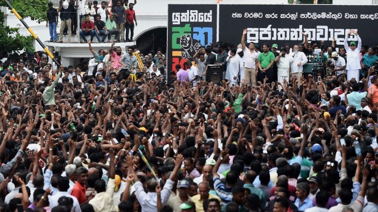 Supporters of ousted Sri Lanka's Prime Minister Ranil Wickremesinghe protesting his sacking by the president. 