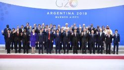 topshot-argentina-g20-summit-family-photo-1543664669759.jpg