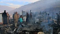 lebanon-syria-conflict-refugees-fire-1543825427662.jpg