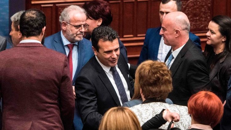 Macedonia's Prime Minister greets deputies after their vote to change the country's name to The Republic of North Macedonia