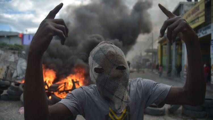 Kadras iš vieno iš daugelio protestų Haičio sostinėje