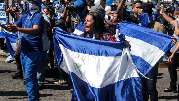 Protesters march in Nicaragua's capital