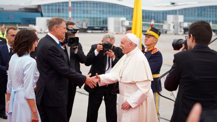 Pope Francis greets the President of Romania