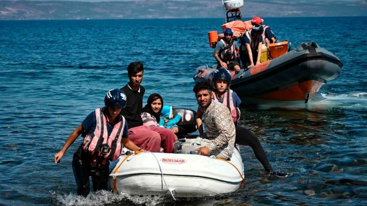 Migrants helped by rescuers in Greece after having crossed the Aegean Sea from Turkey
