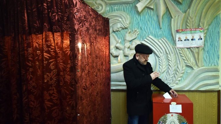 A man casts his ballot at a polling station in Belarus