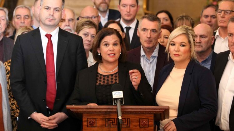 The Sinn Fein Party leader and colleagues during a press conference at Parliament Buildings in Stormont after announcing power-sharing deal