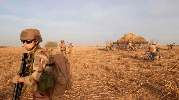 (File photo) French soldiers patrol a rural area in northern Burkina Faso