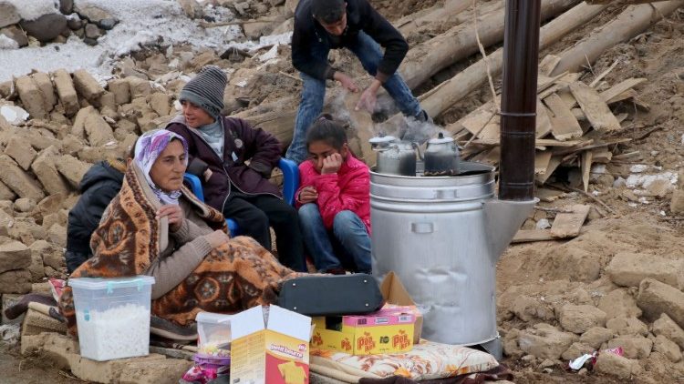 A quake-struck family in Baskale on the border between Iran and Turkey  
