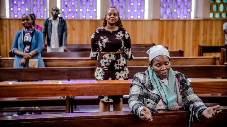 Some parishioners praying in the Holy Family Minor Basilica of Nairobi, Kenya