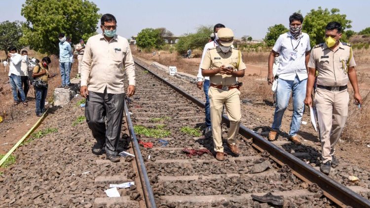 Police inspecting the site where a freight train killed 16 migrant workers in Maharashtra state, India.