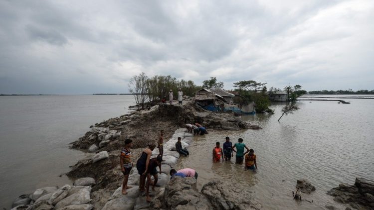Destruction and flooding in Burigoalini, Bangladesh, after Cyclone Amphan. 