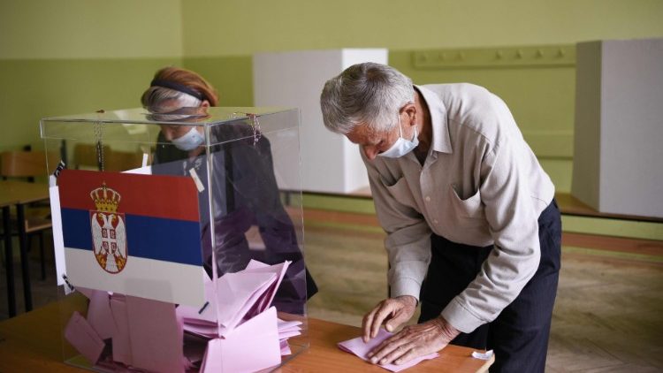 Voters cast their ballots in Gracanica