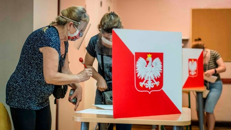 Poles vote at a polling station in Warsaw