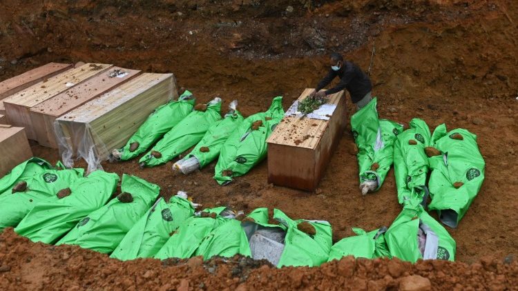 A mass grave of the dead bodies of people killed at a jade mine in Kachin state, Myanmar, July 4, 2020. 
