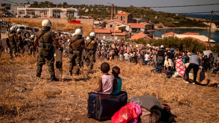 Refugees and migrants from the Moria camp stranded on the island of Lesbos after the camp burnt down