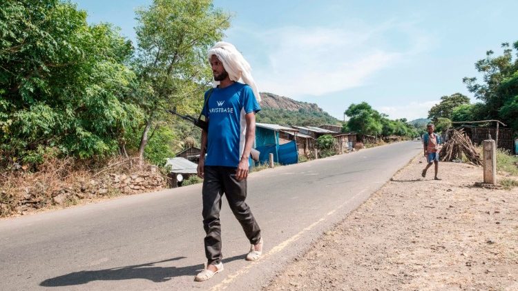  An Ethiopia's Amhara Region militia man walks in the town of Musebamb, 44 kms northwest from Gondar, Ethiopia