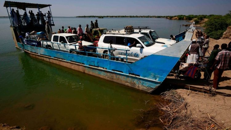 UNICEF transport arrives by ferry to a reception centre in Sudan