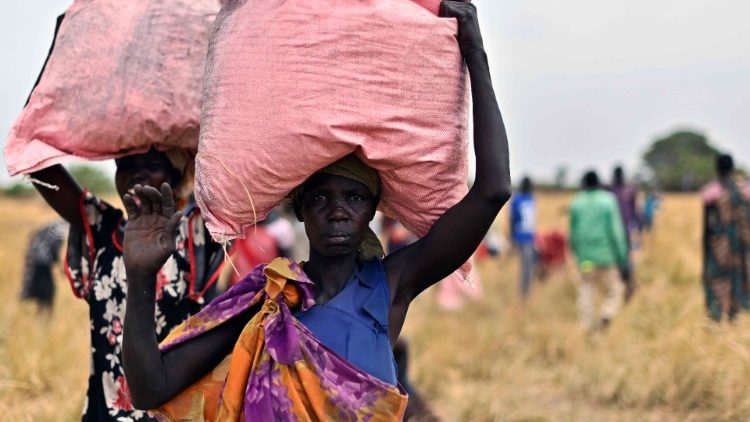 The World Food Programme delivers aid to a village in South Sudan as part of its effort to provide assistance to millions of people impacted by the pandemic and with famines looming